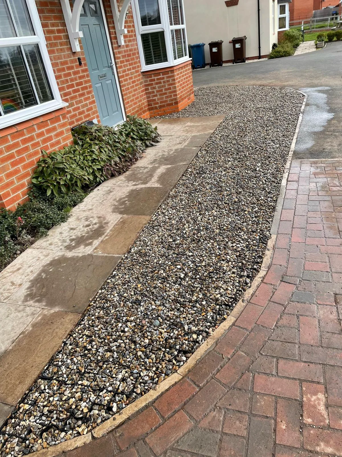 Permeable gravel driveway detail.