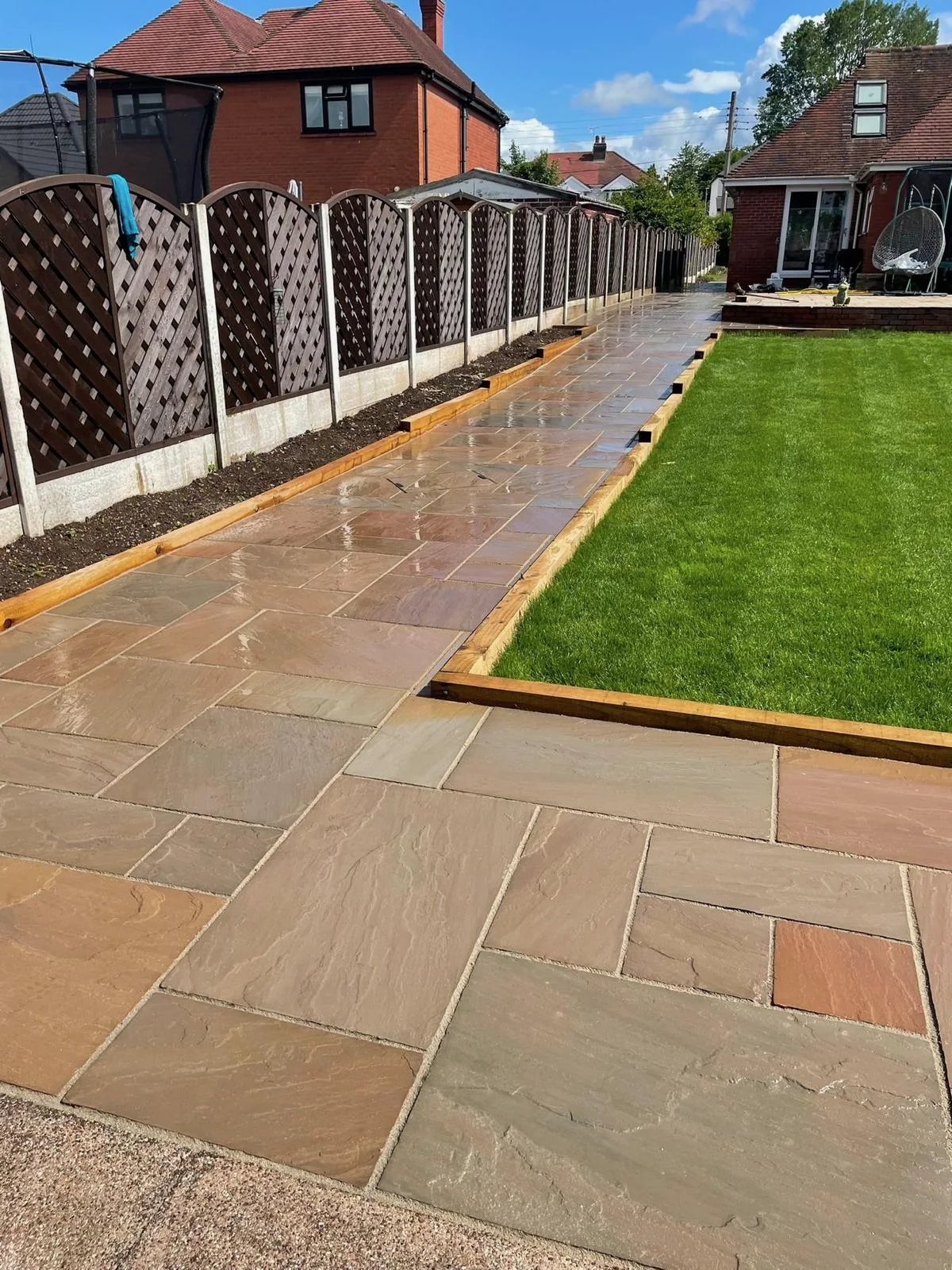 Lawn and path landscaping in a Staffordshire garden.