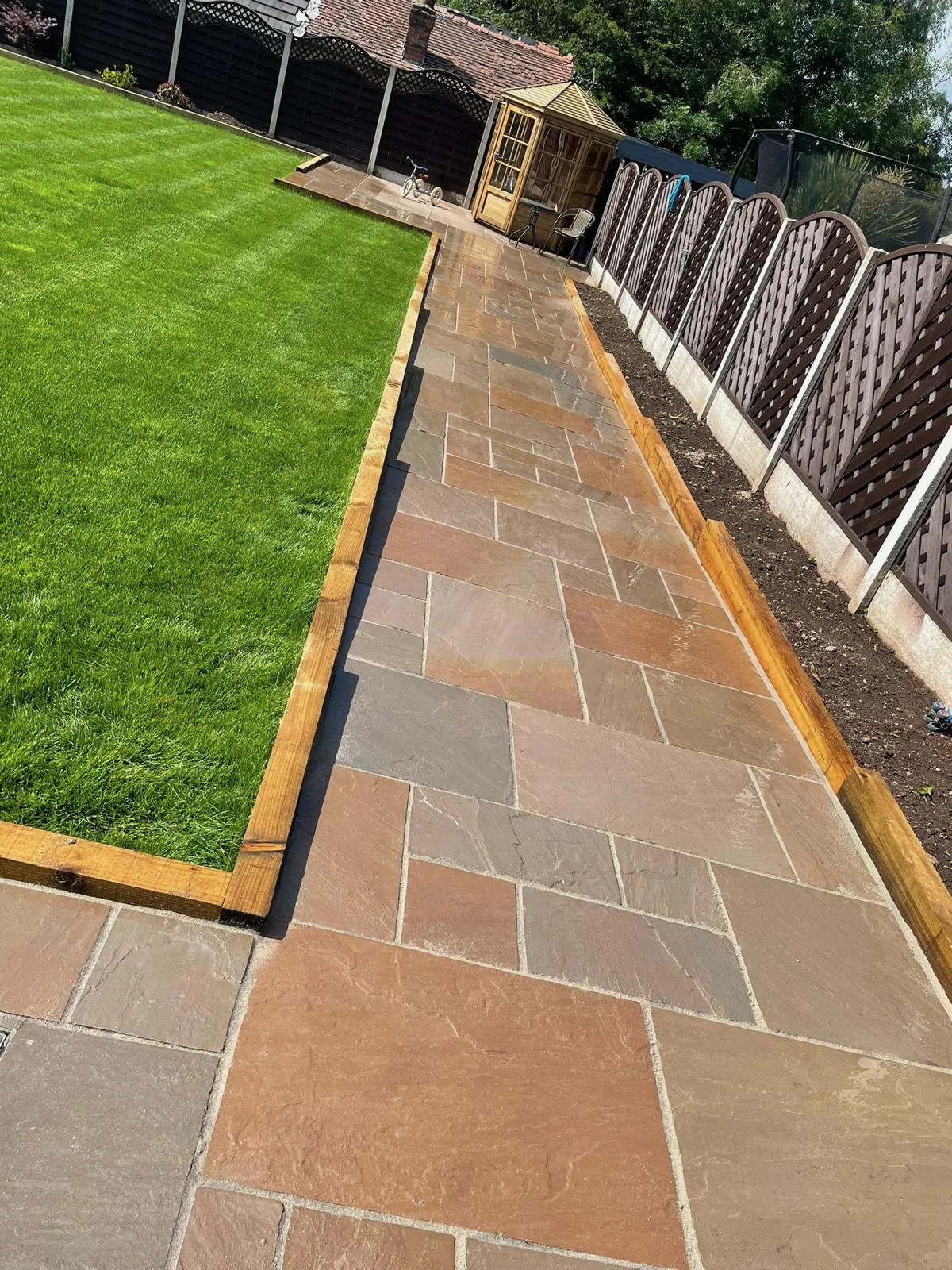Side path and lawn landscaping.